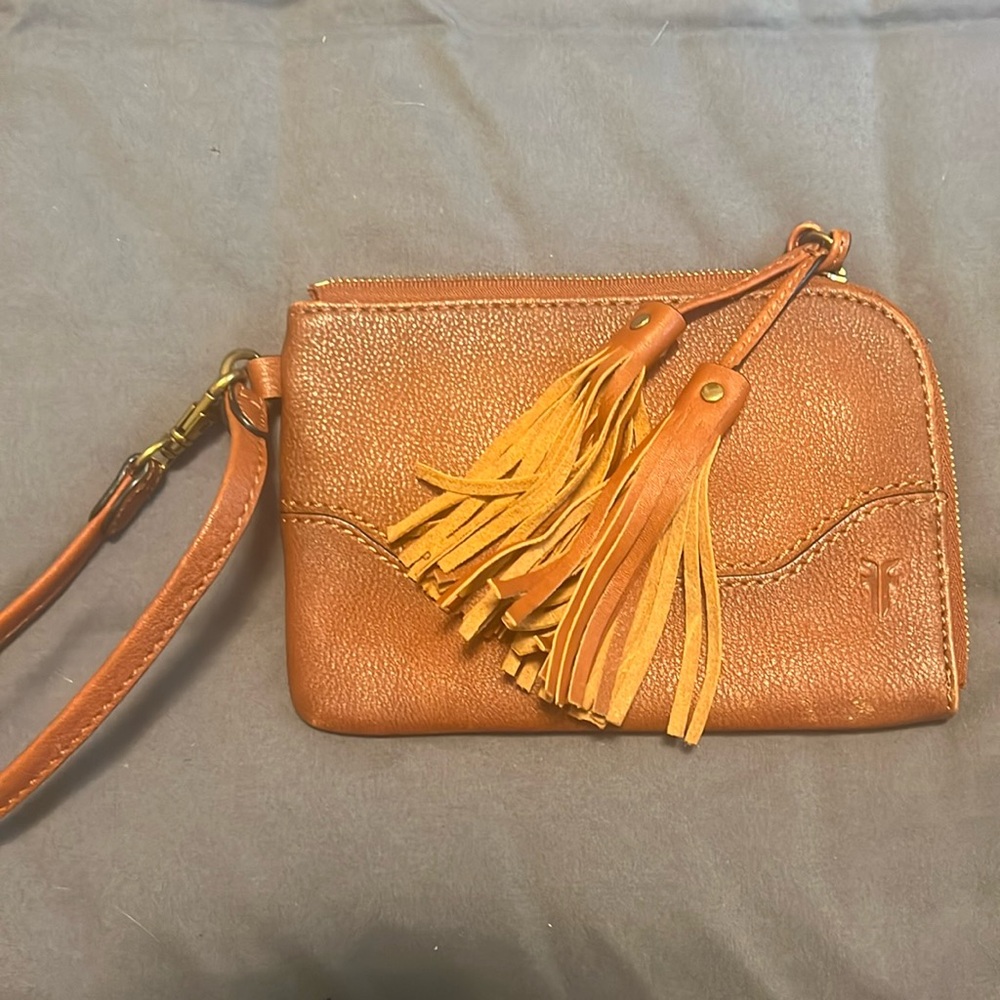Frye brown leather wristlet with fringe tassel